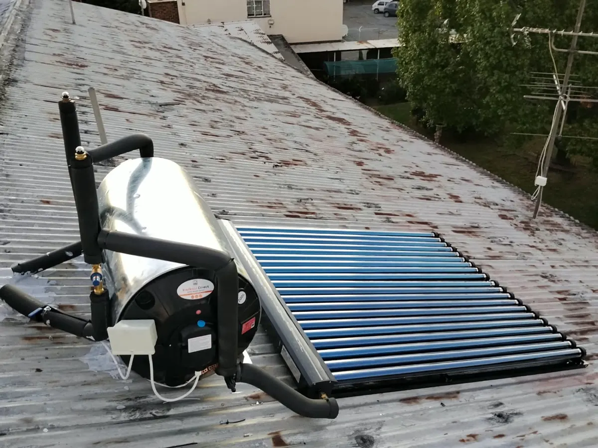 Solar geyser with evacuated tubes installed on a corrugated iron roof